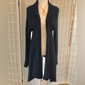 RENEE C. Black sweater longer in front on sides. Very flattering design SZ L